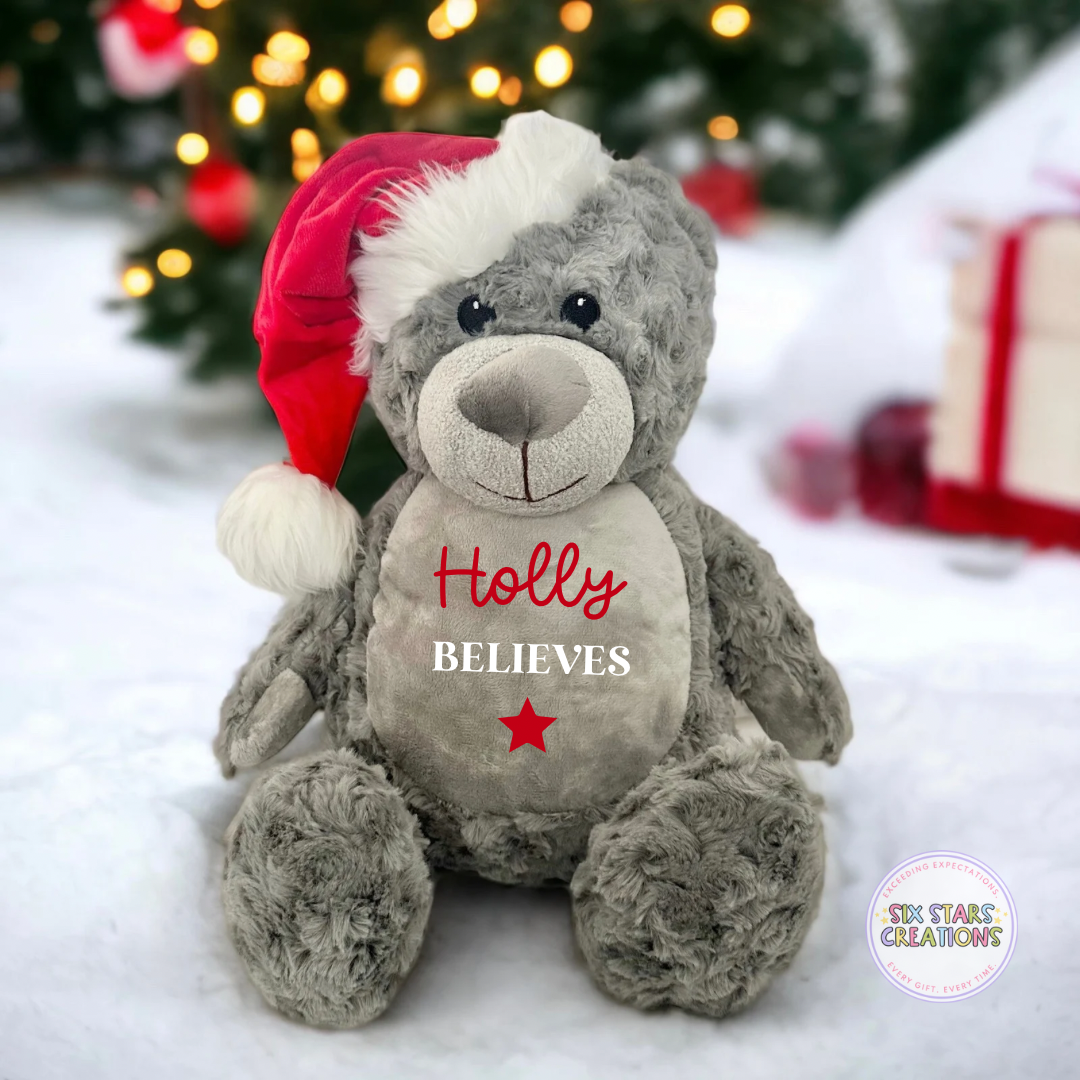 Personalised ‘Believes’ Grey Bear With Santa Hat